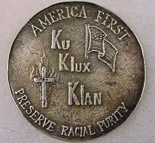 KKK America First medal: Creative Commons License is licensed under a Creative Commons Attribution-ShareAlike 4.0 International License.